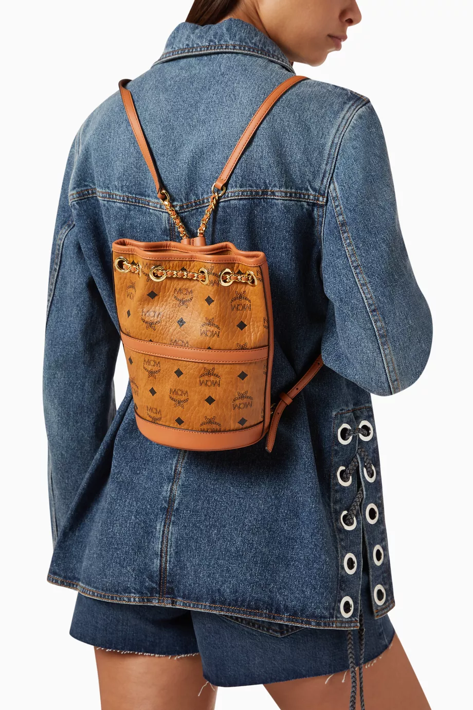 Mcm mini best sale sling backpack