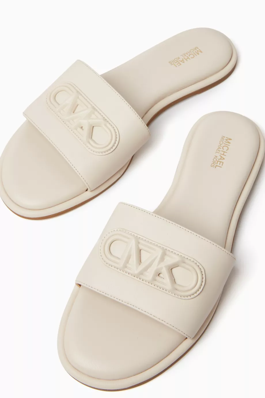 Buy Michael Kors Neutral Saylor Slide Sandals in Leather for Women