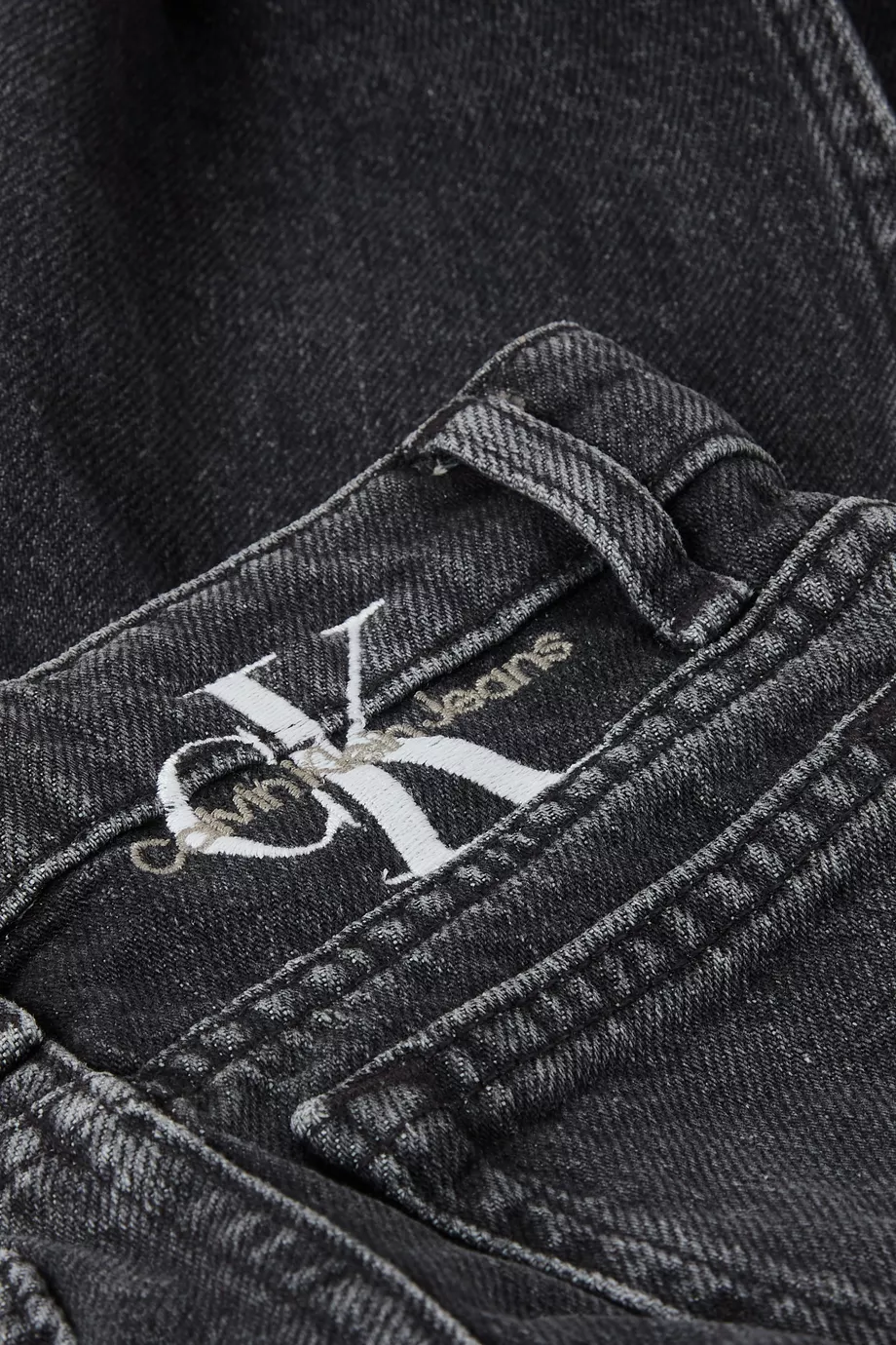 Buy Calvin Klein Black High rise Wide leg Jeans in Denim for Girls in UAE Ounass