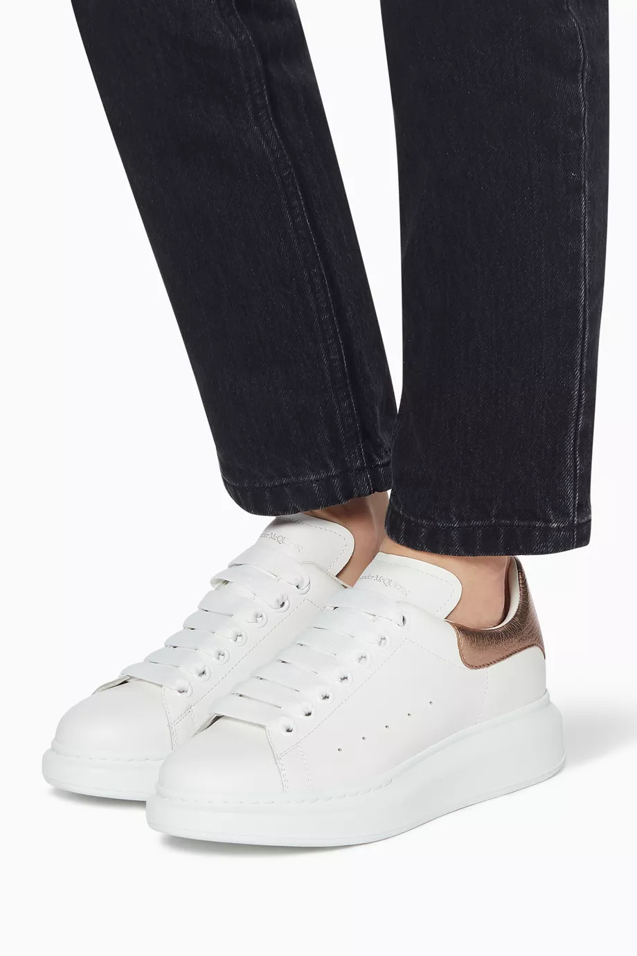 Alexander mcqueen trainers rose gold best sale