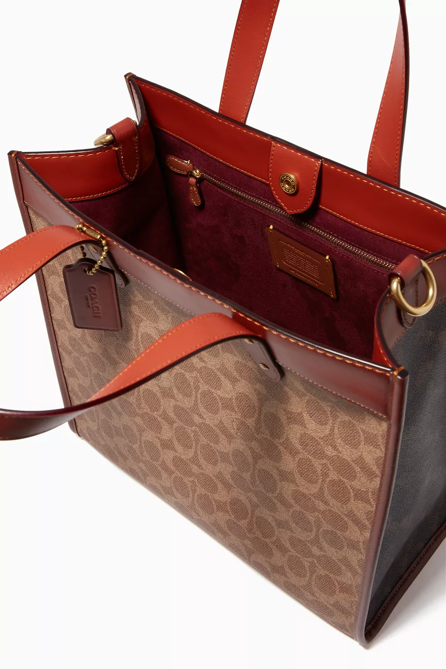 Buy Coach Brown Field Tote in Signature Canvas with Horse Carriage Print For Women Online Ounass UAE