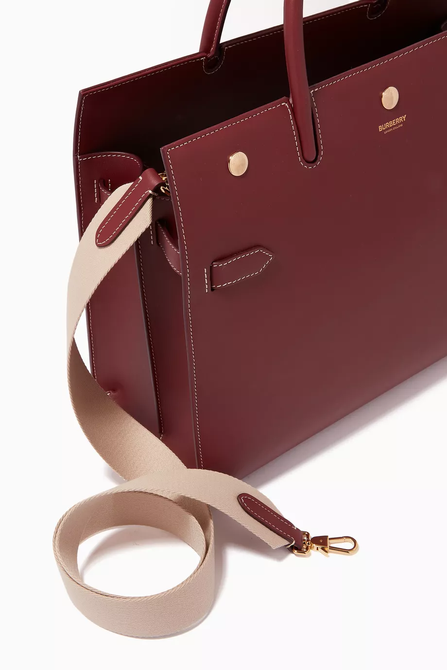 Buy Burberry Burgundy Medium Two-Handle Title Bag in Leather For