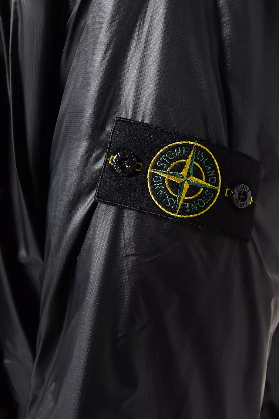 Stone island black shiny jacket hot sale